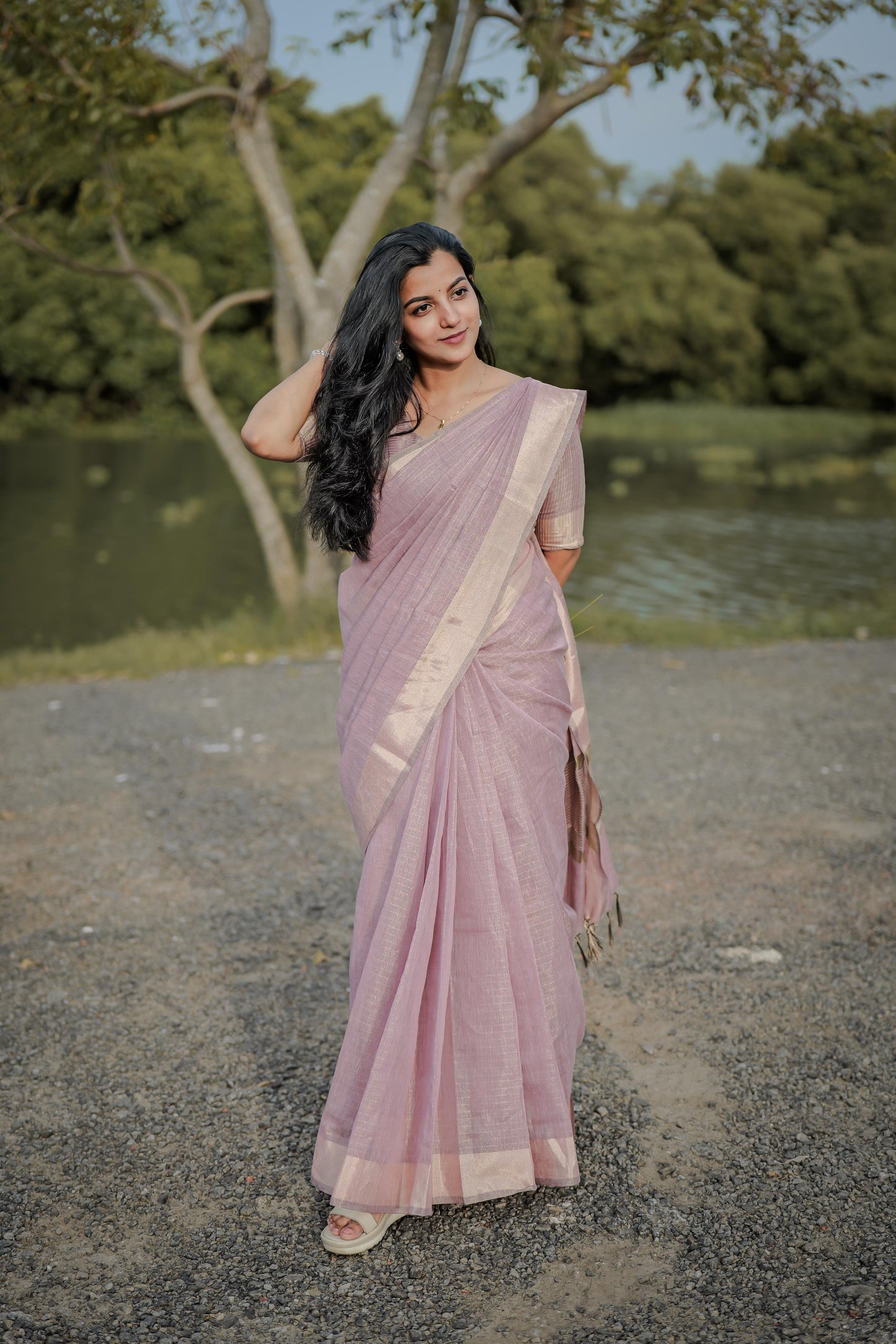 Tissue checks pastel shade saree with tussles