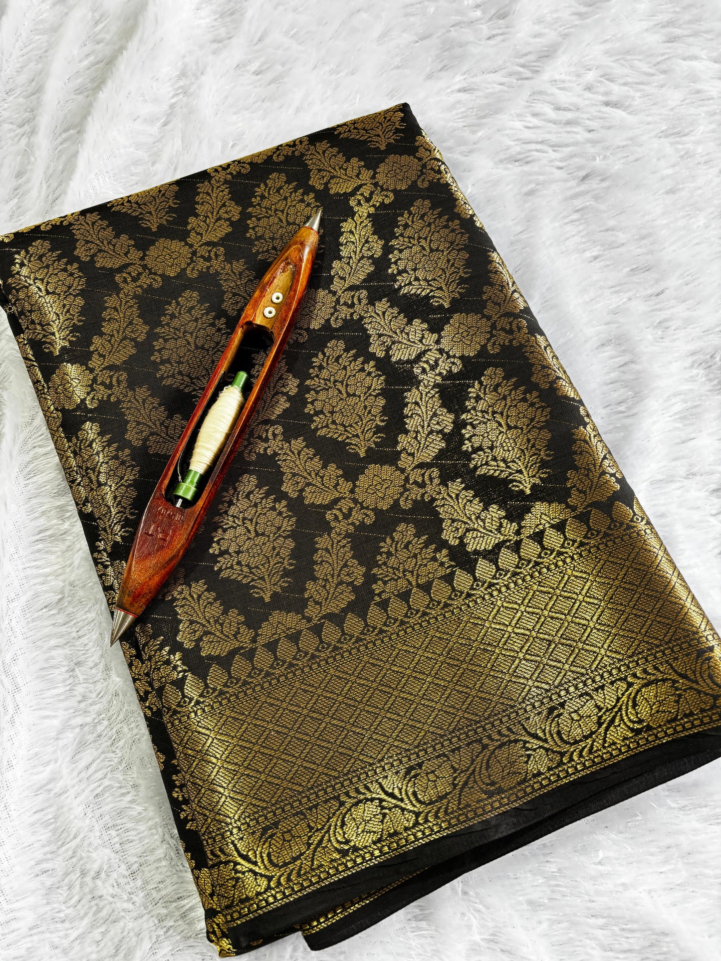 Black and gold full jacquard weave saree