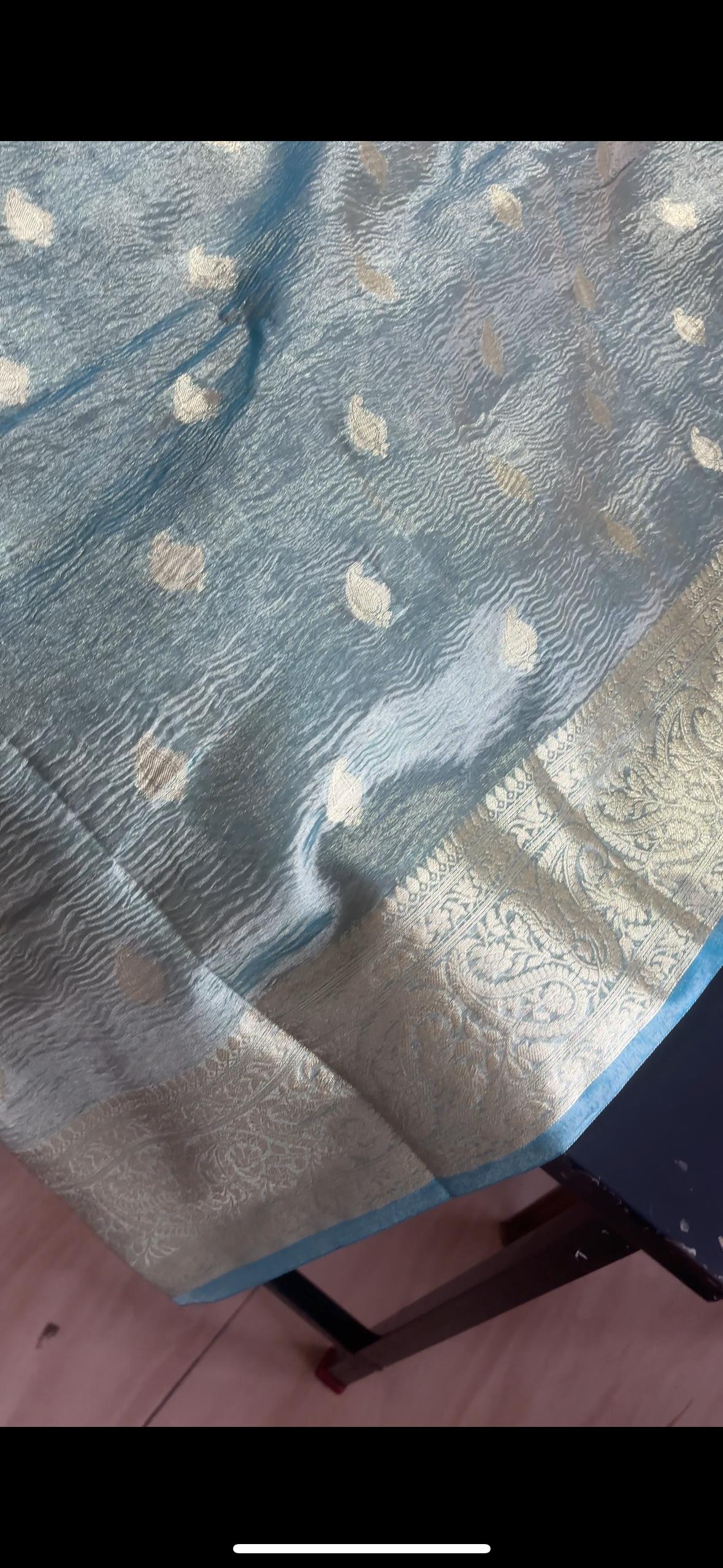 Divya Unni inspired crushed tissue saree