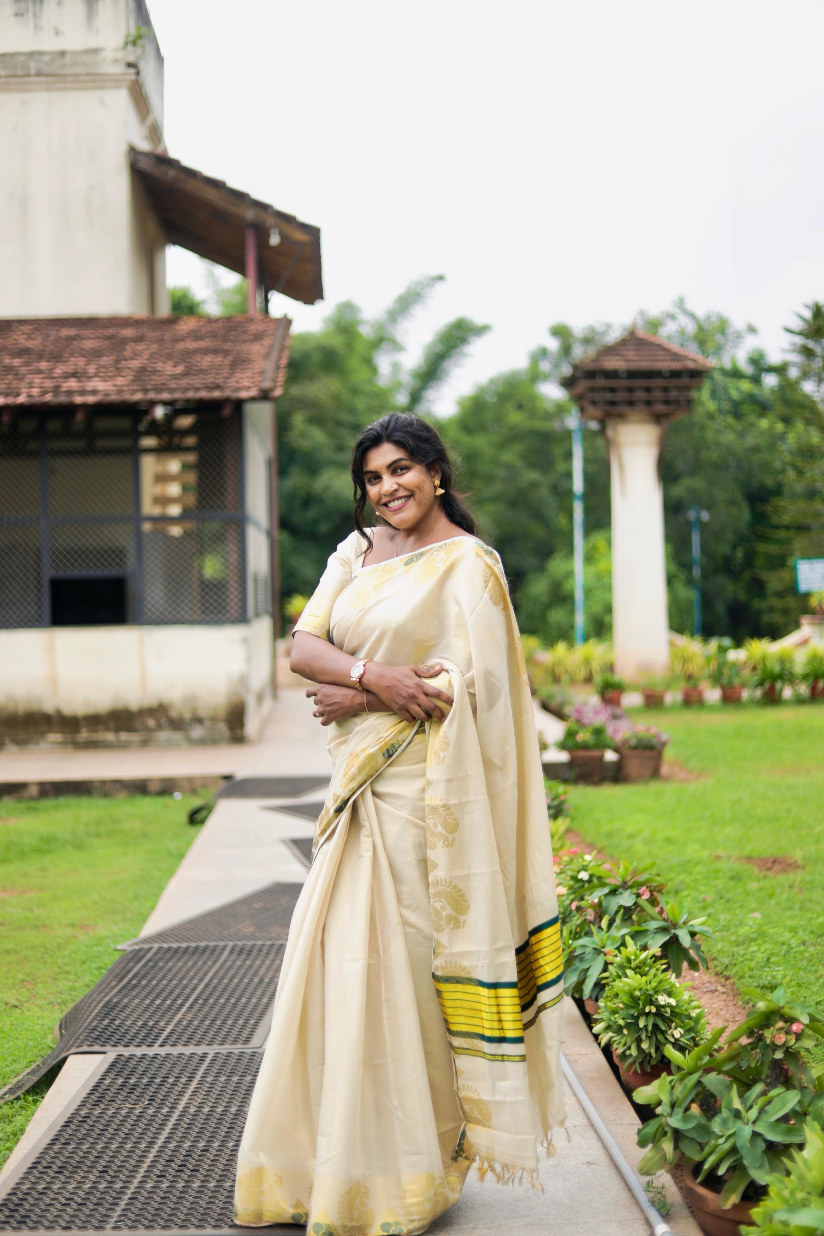 Peacock border golden tissue saree