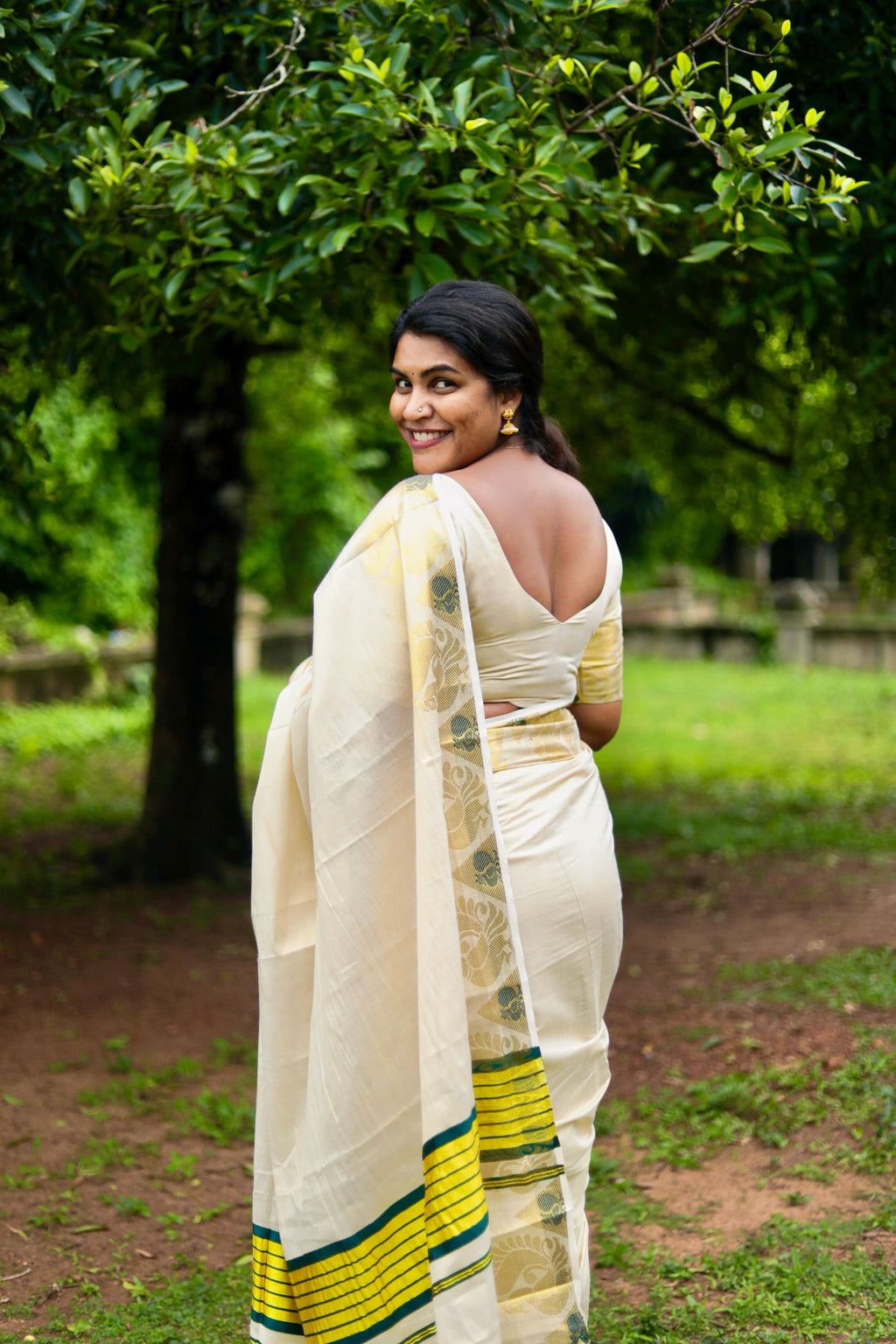 Peacock border golden tissue saree