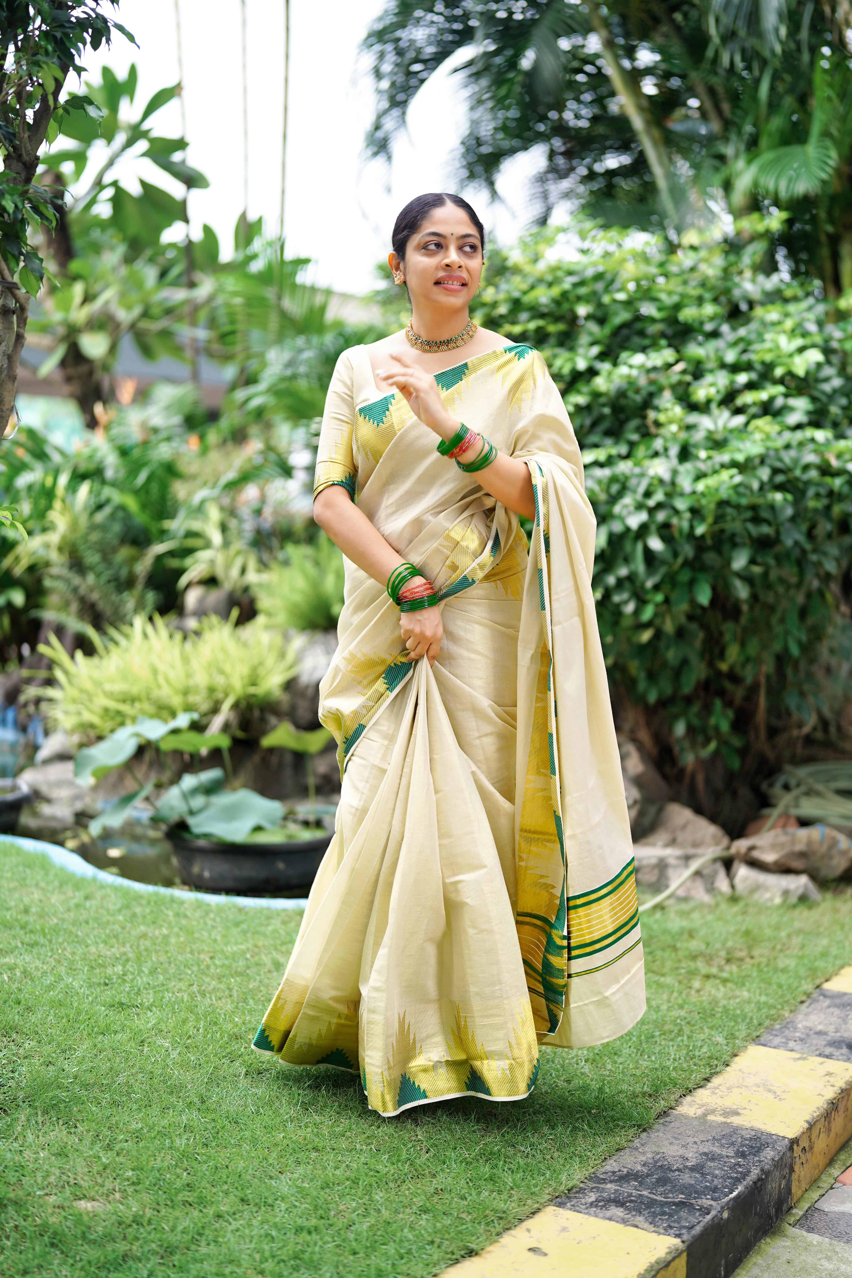 Temple golden tissue saree bottle green