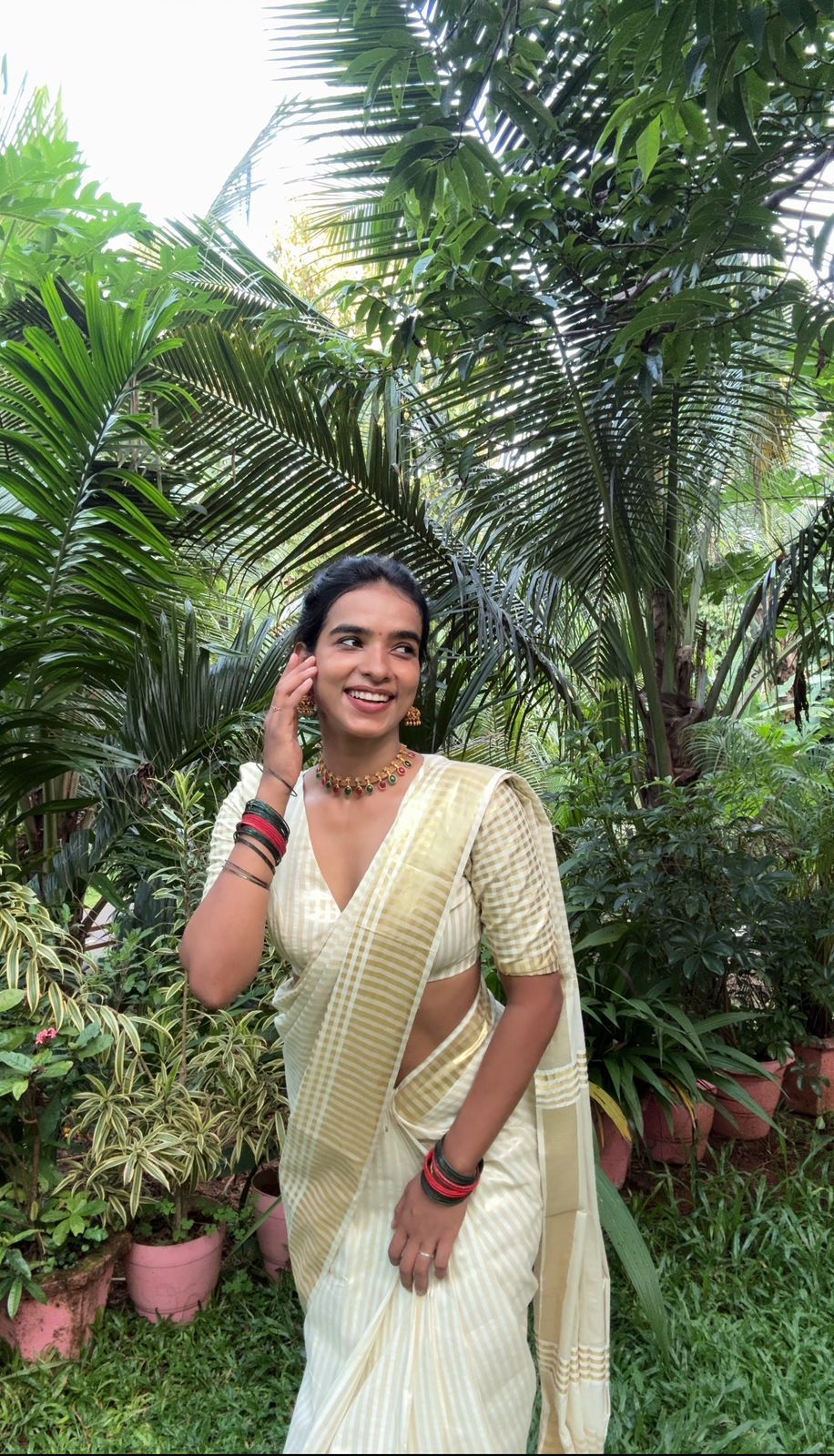 Golden tissue checked big border saree