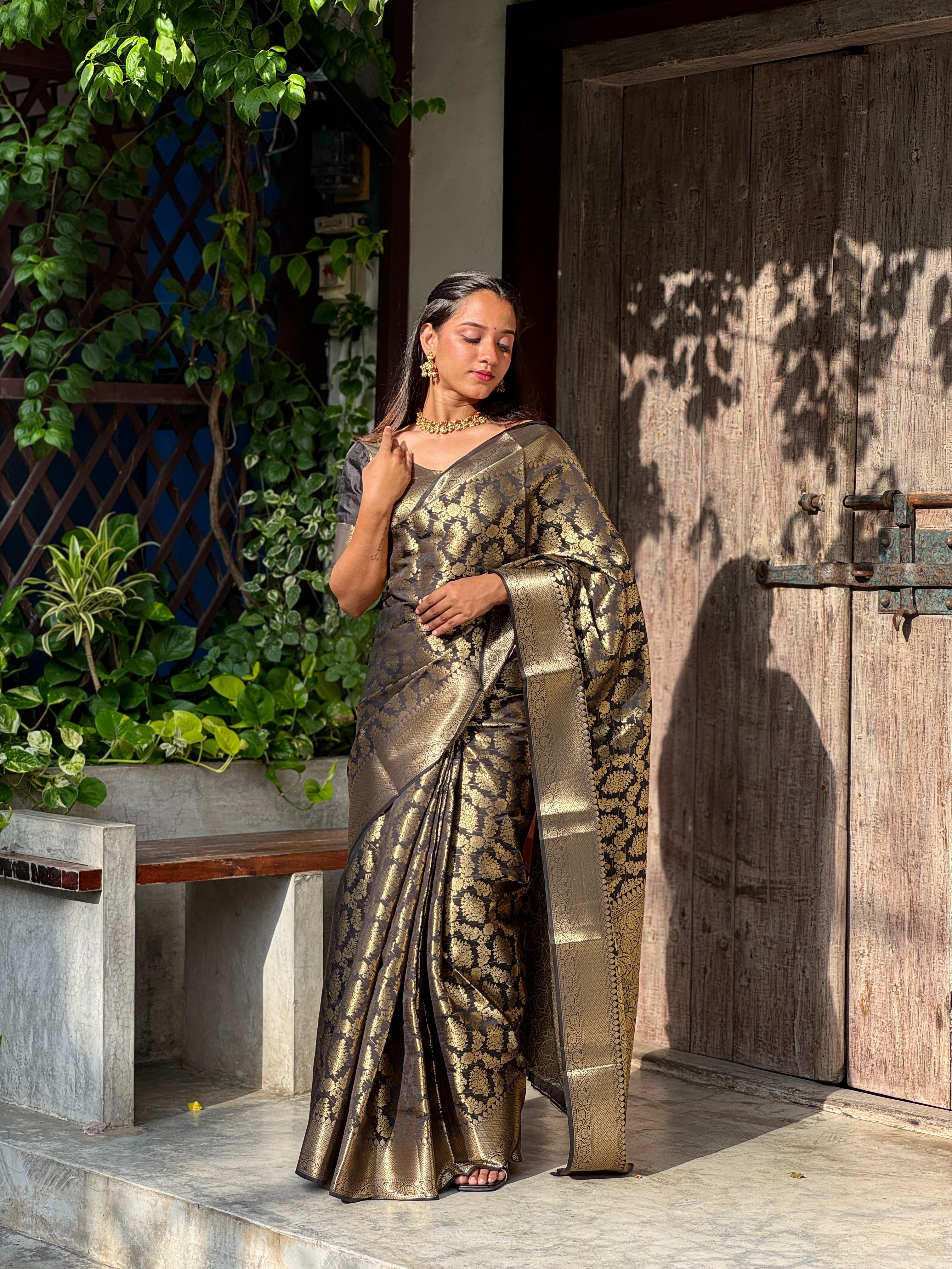 Black and gold full jacquard weave saree