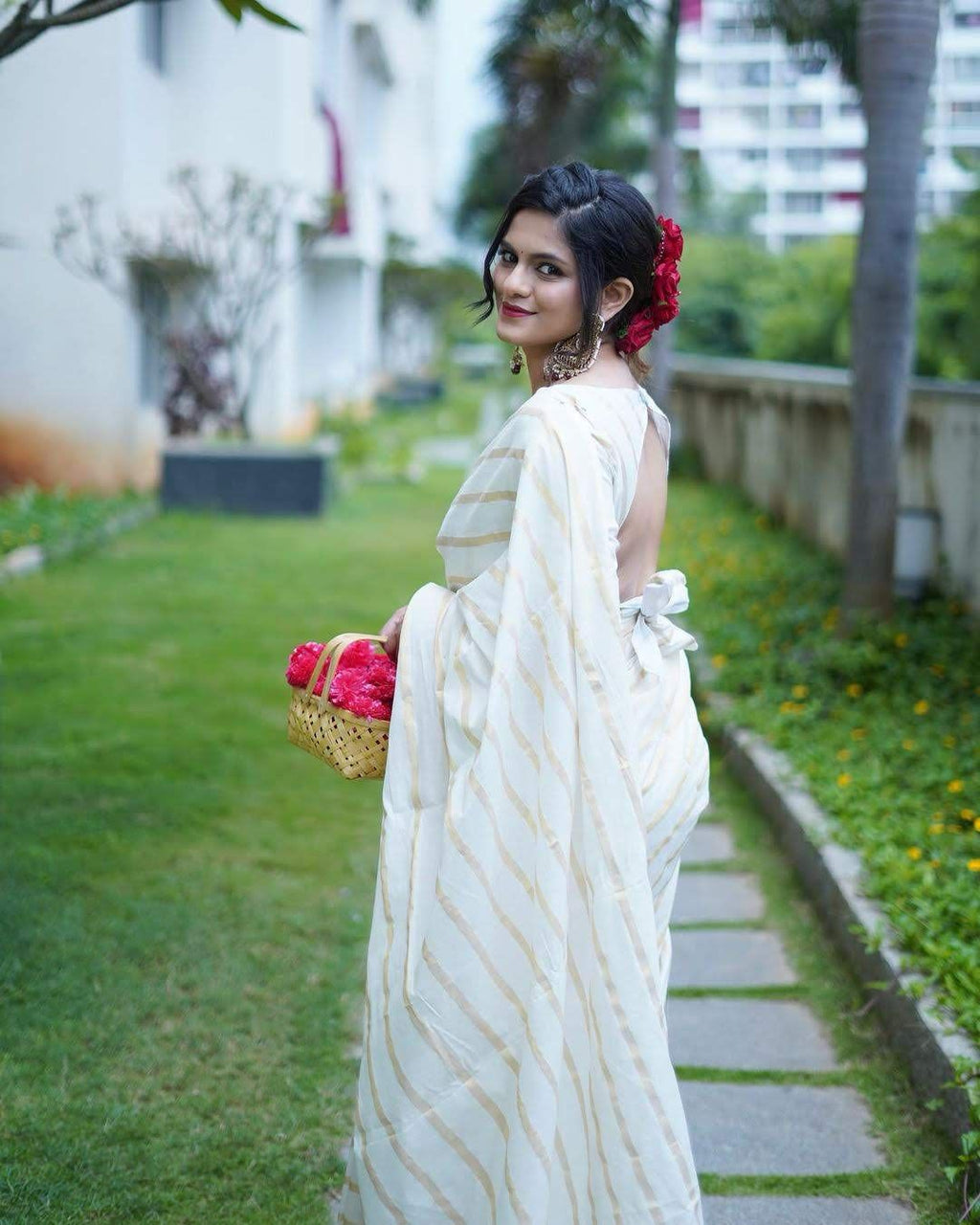 Cotton golden lines saree with tussels