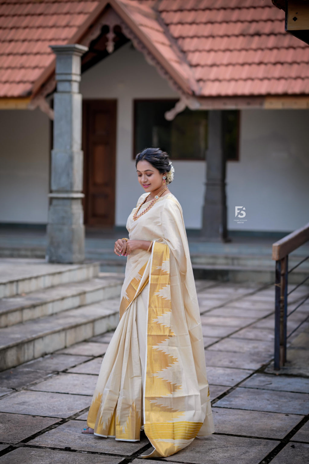Border temple weave golden tissue saree