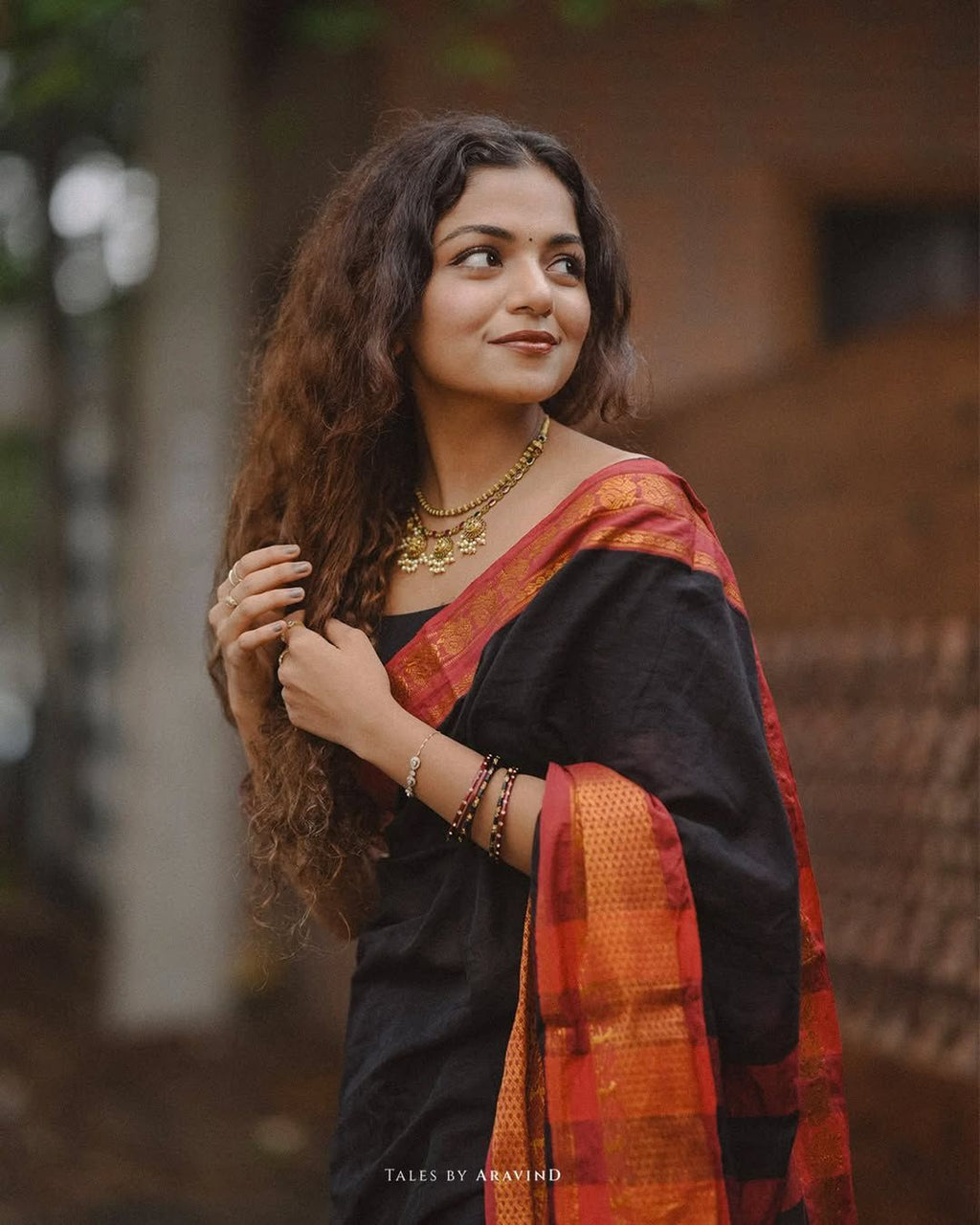 Hansika black peacock motif cotton saree