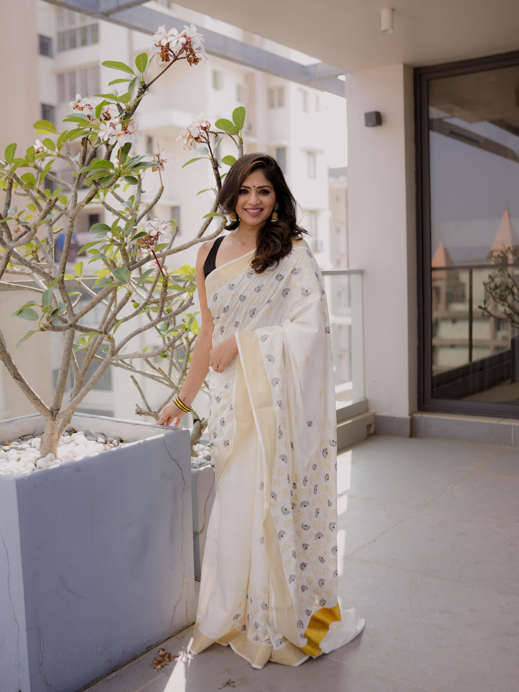 Mul flower gold and black cotton embroidered saree