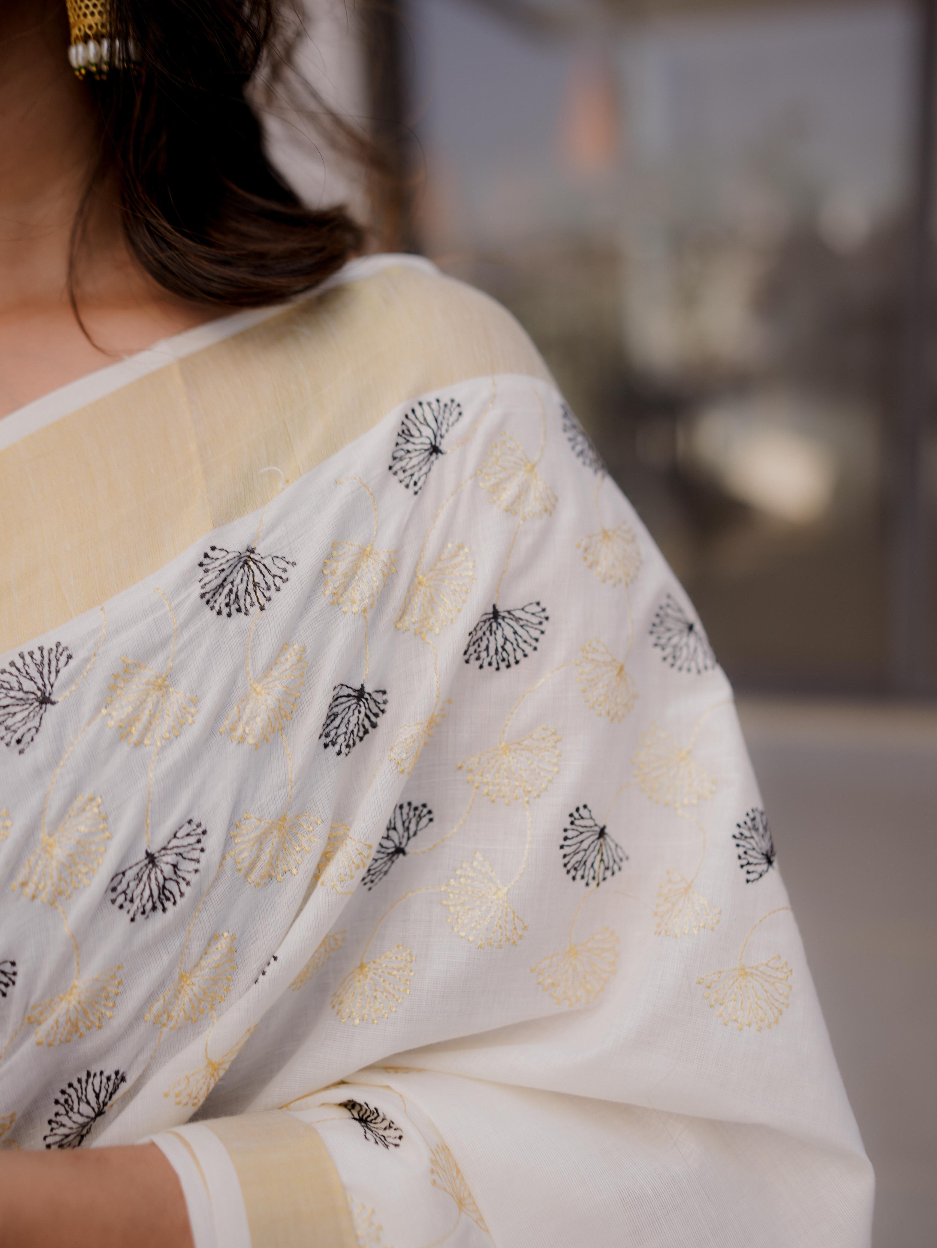 Mul flower gold and black cotton embroidered saree