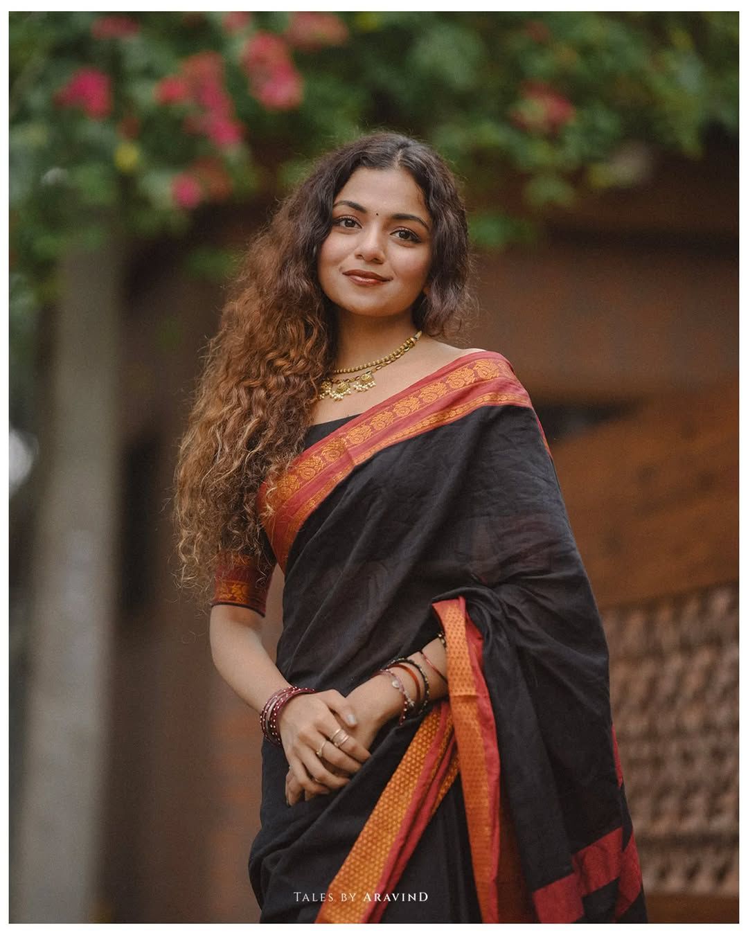 Hansika black peacock motif cotton saree