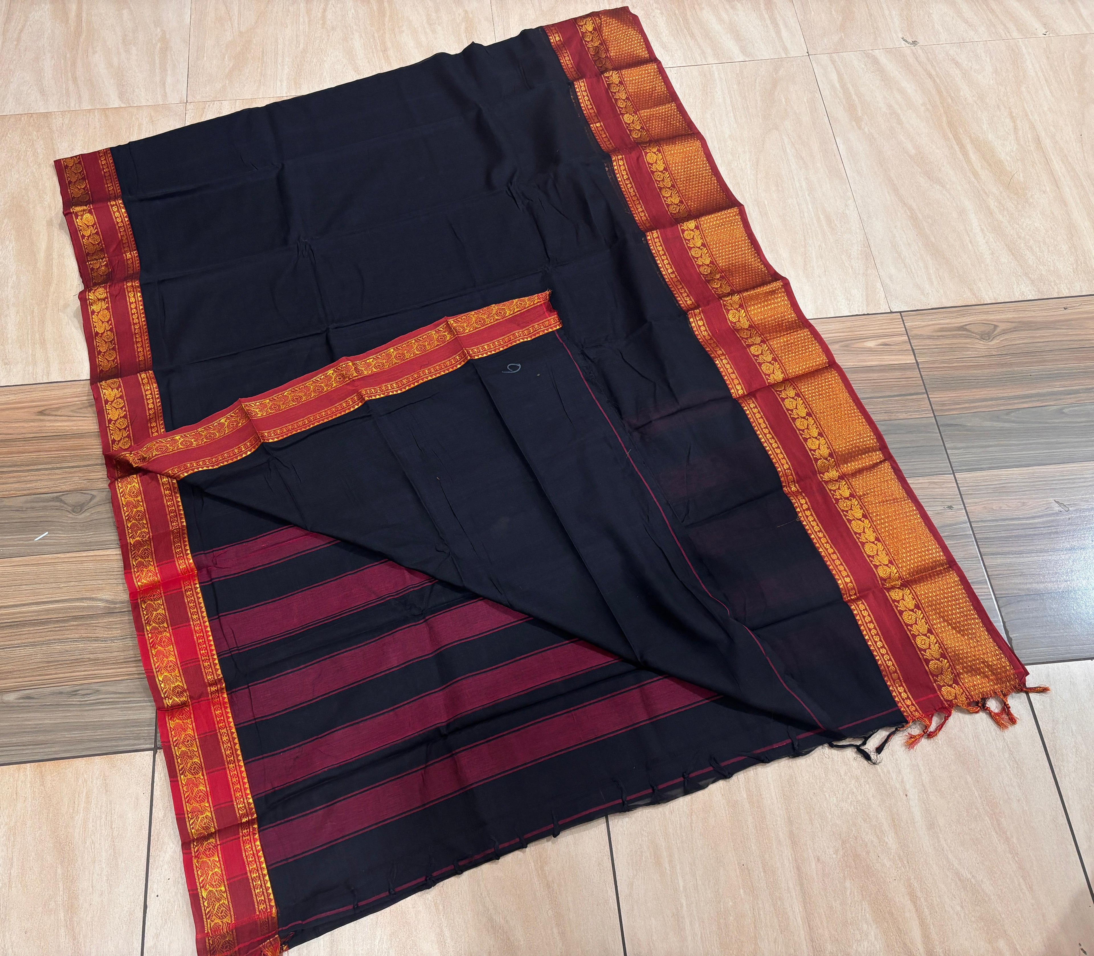 Hansika black peacock motif cotton saree