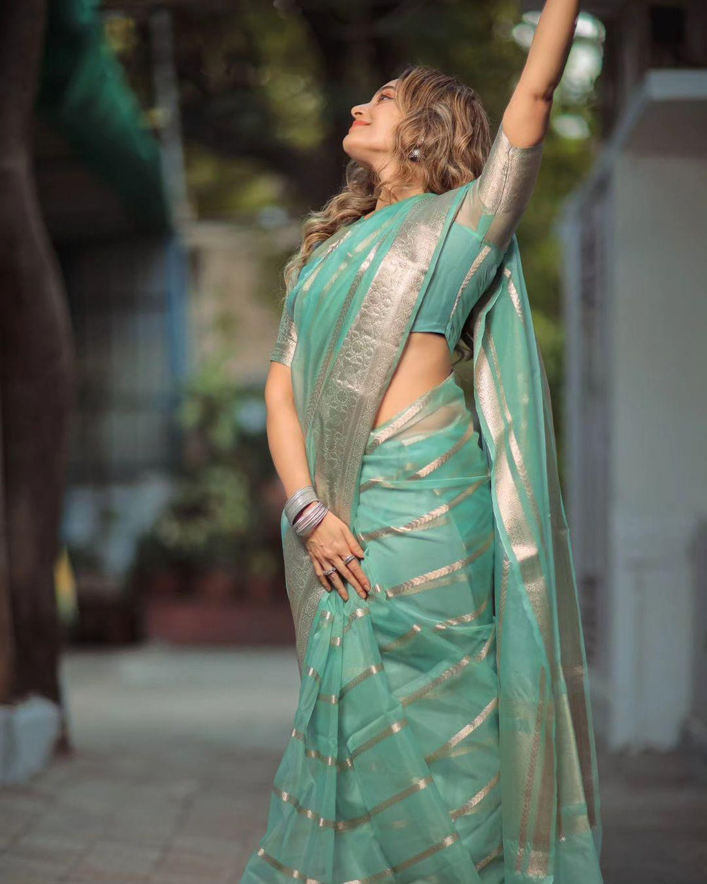 Teal organza saree