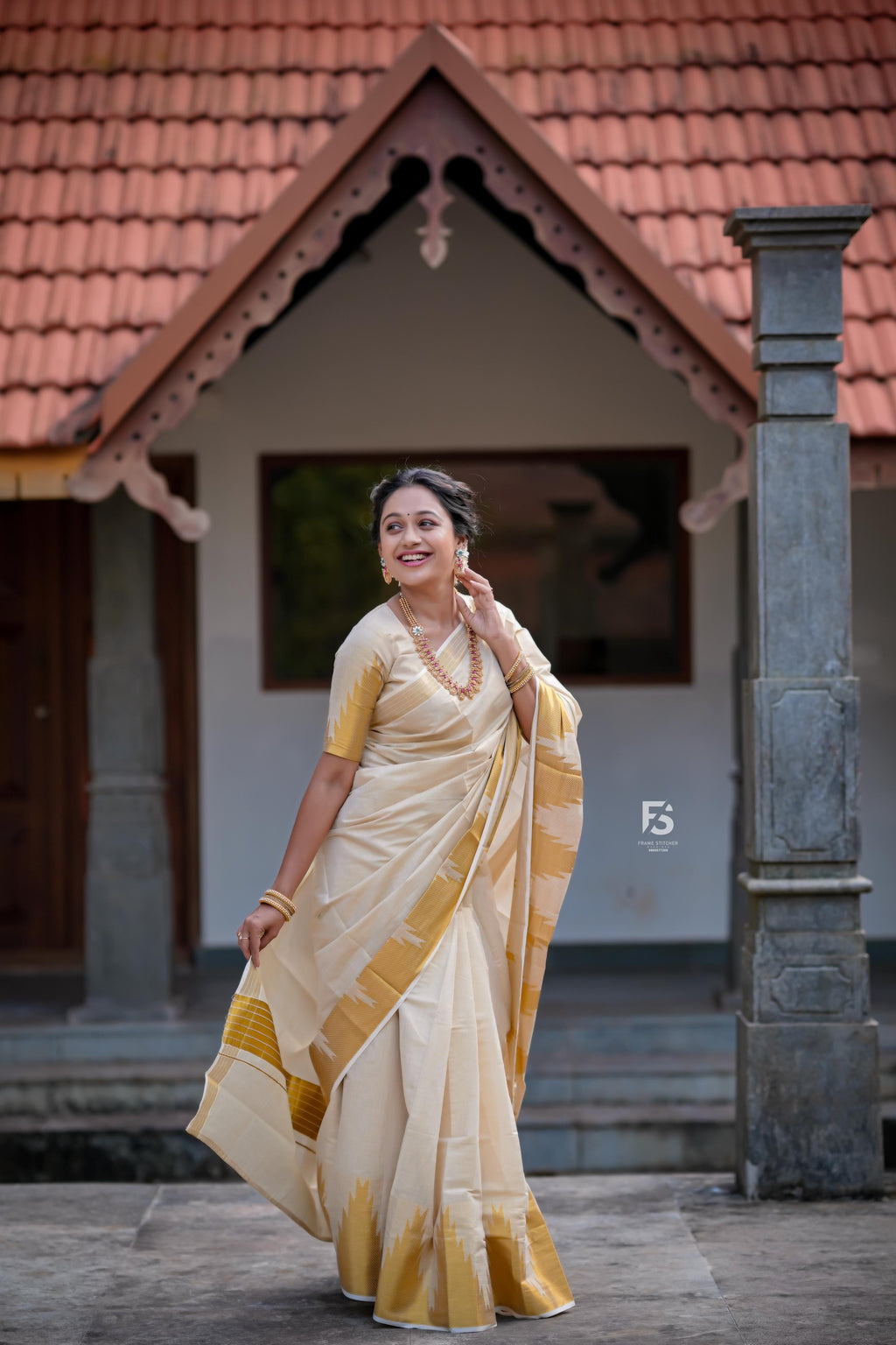 Border temple weave golden tissue saree