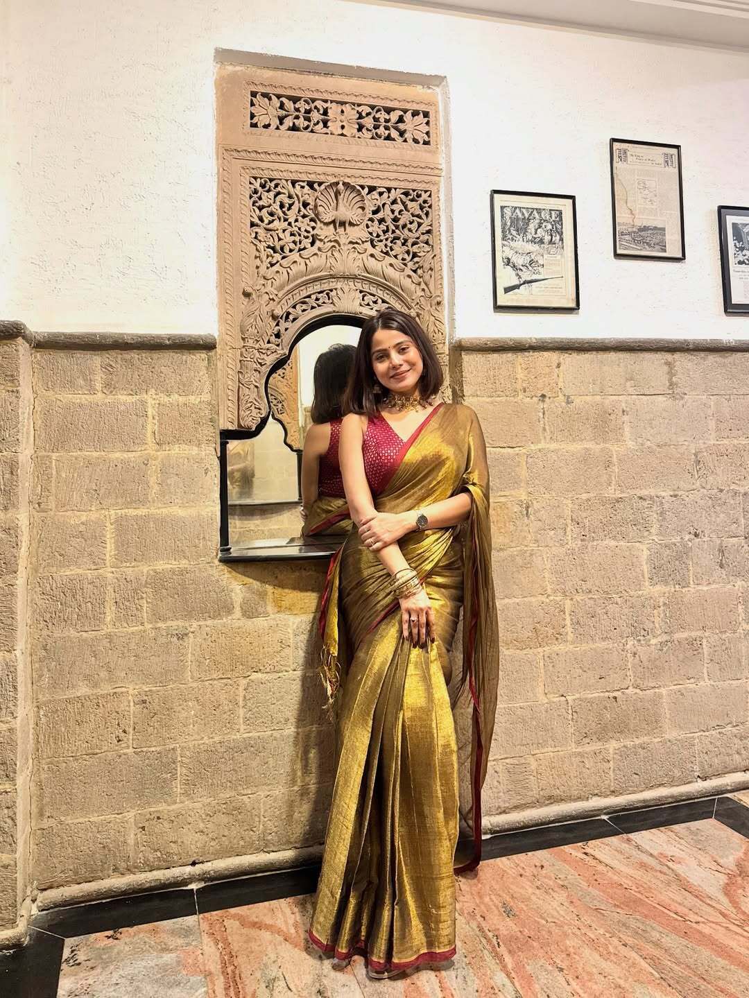 Red border golden tissue saree