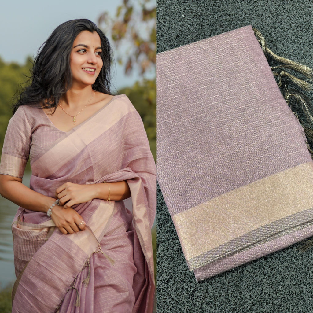 Tissue checks pastel shade saree with tussles