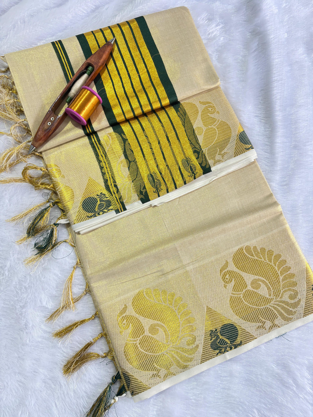 Peacock border golden tissue saree