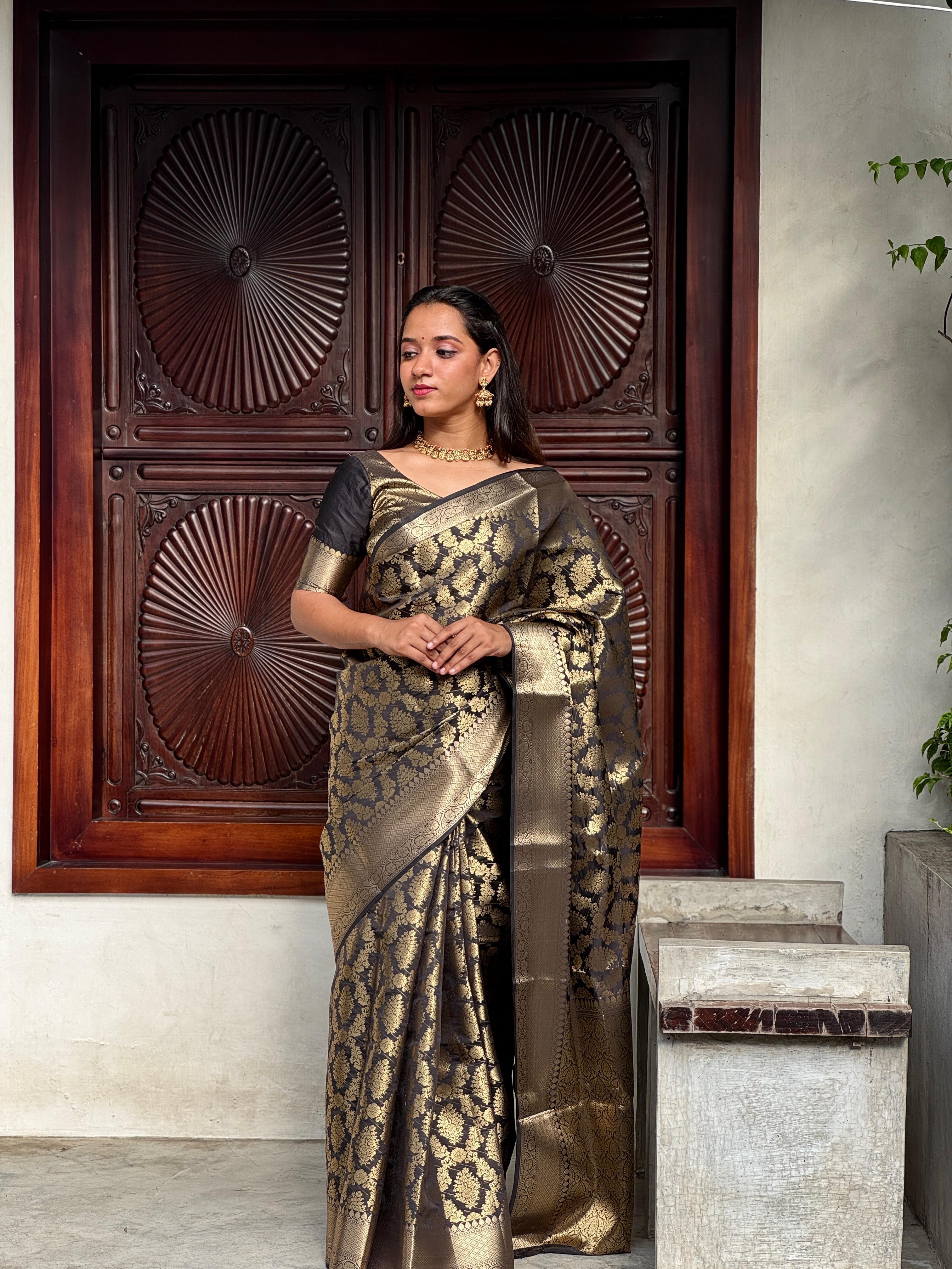 Black and gold full jacquard weave saree