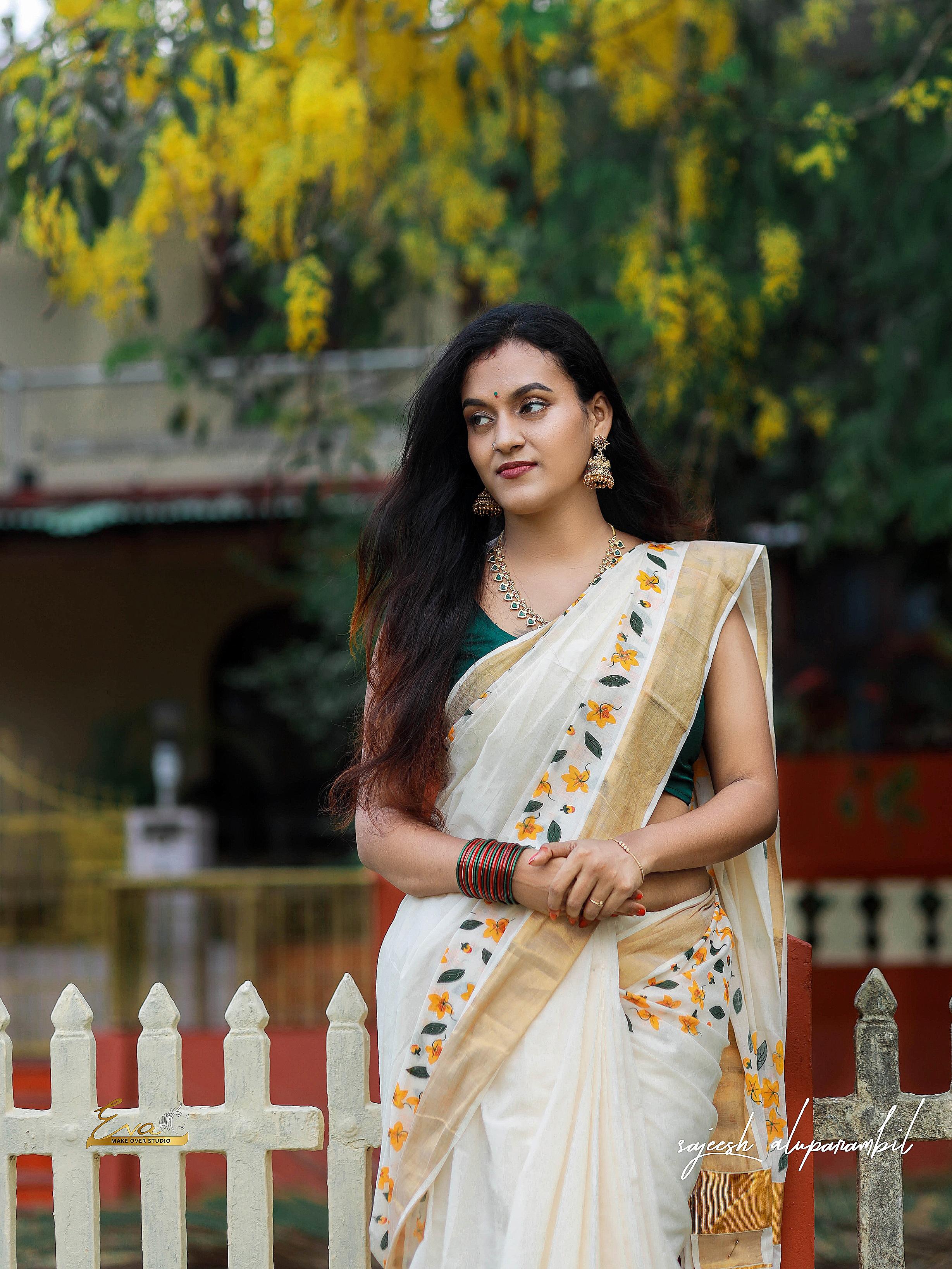 Yellow scattered flower printed cotton saree