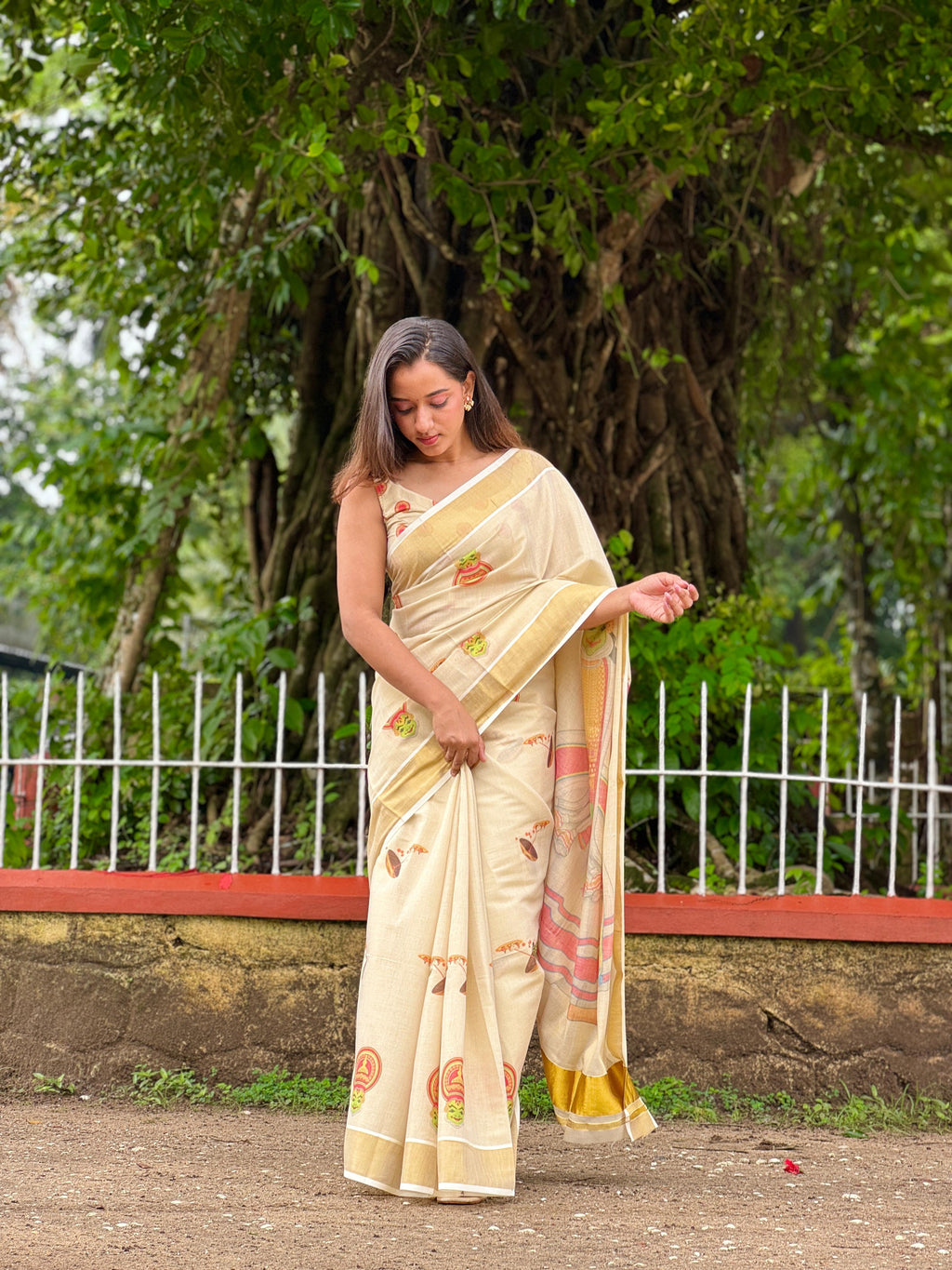 Kathakali and onam theme digital print saree with blouse designs