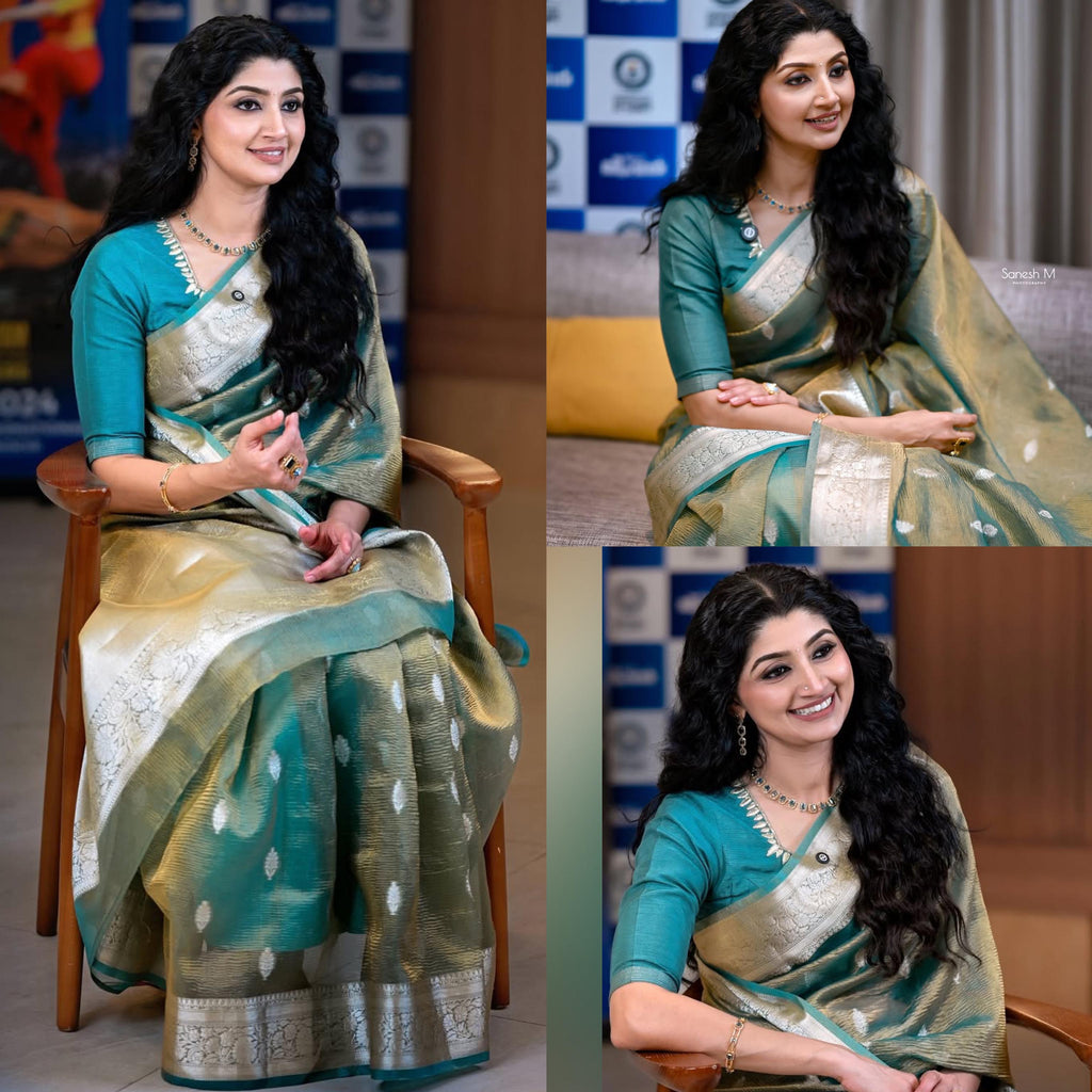 Divya Unni inspired crushed tissue saree