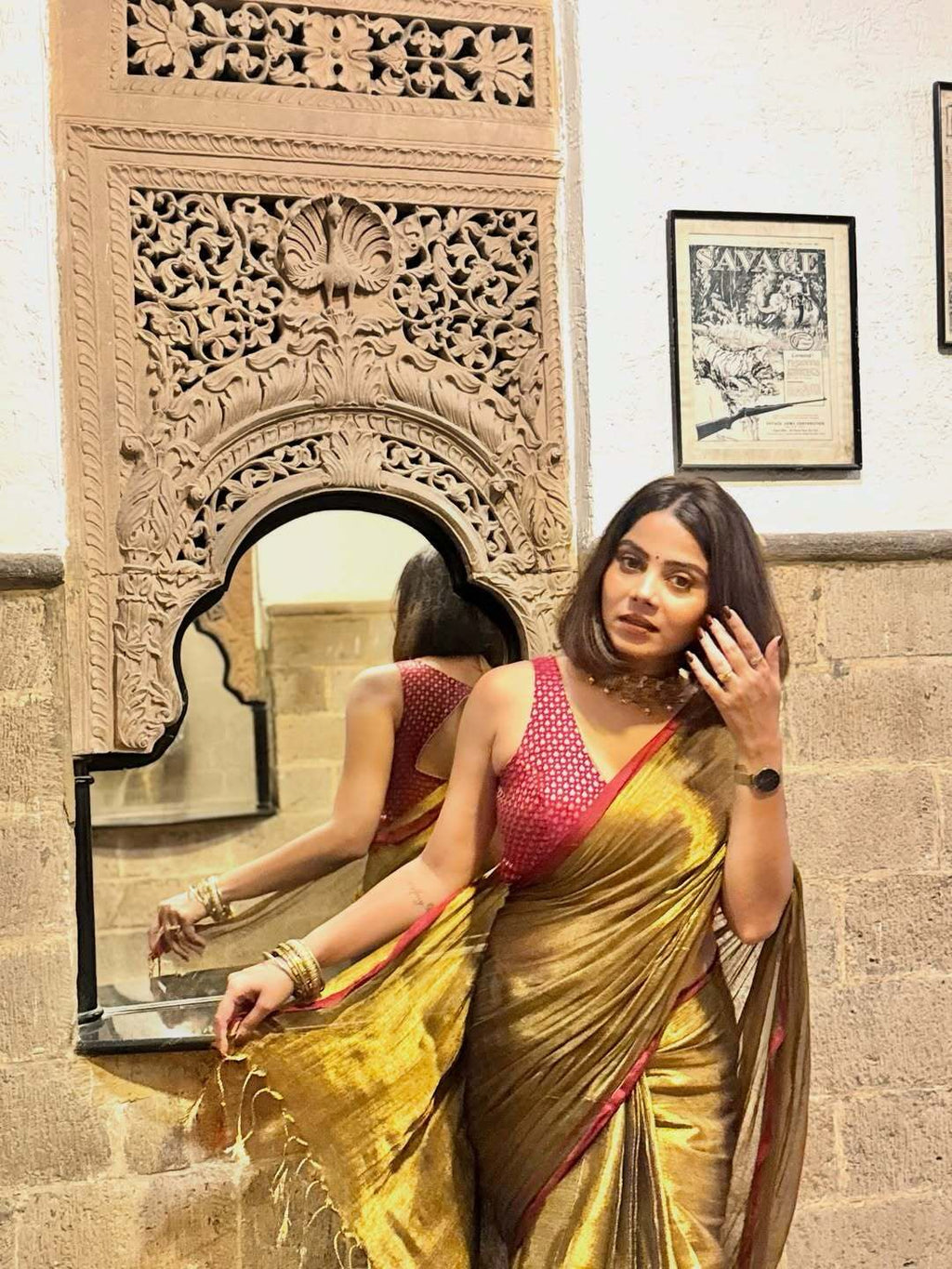 Red border golden tissue saree