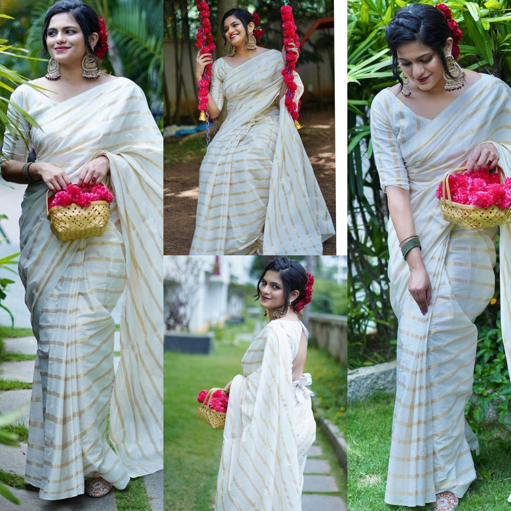 Cotton golden lines saree with tussels