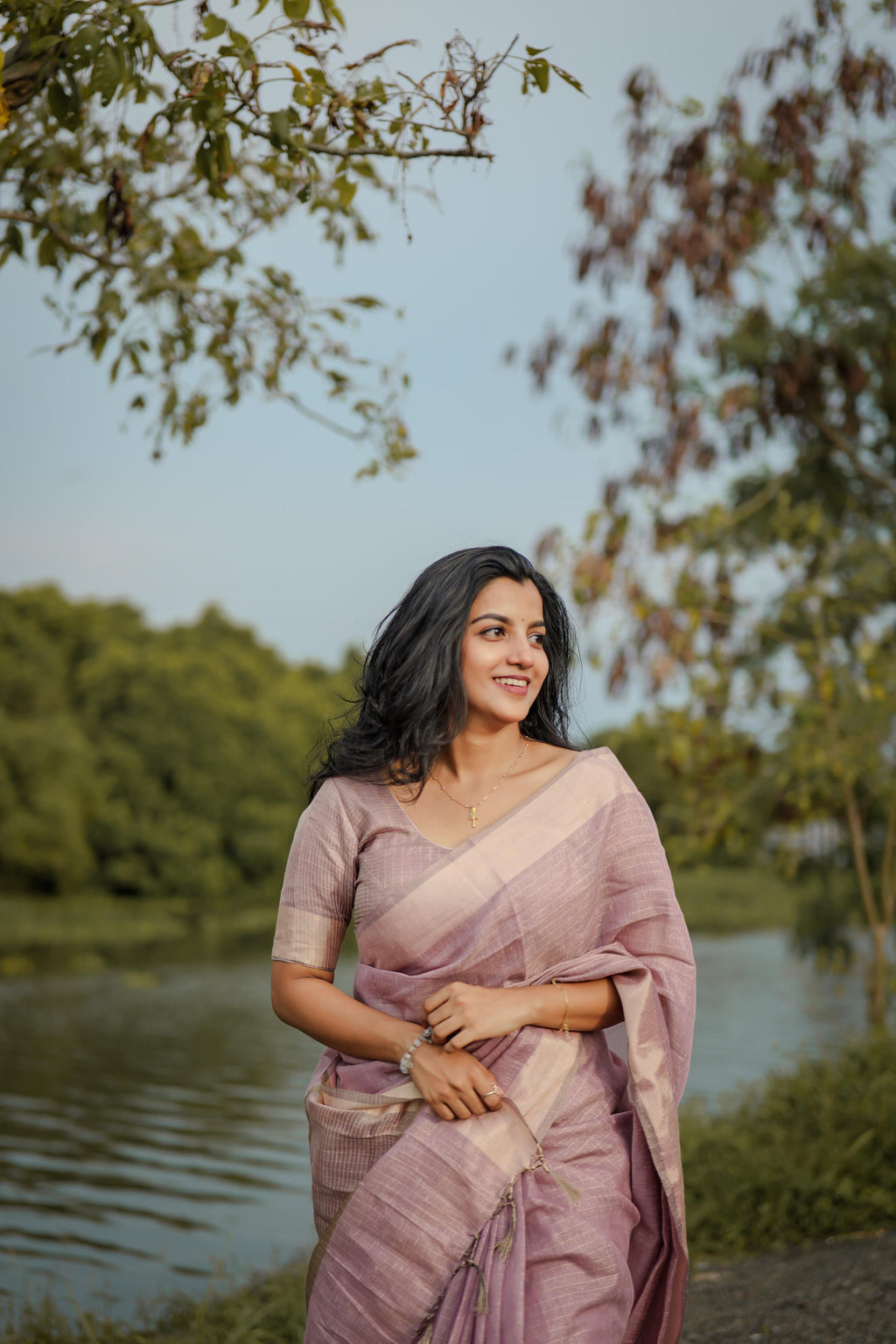 Tissue checks pastel shade saree with tussles