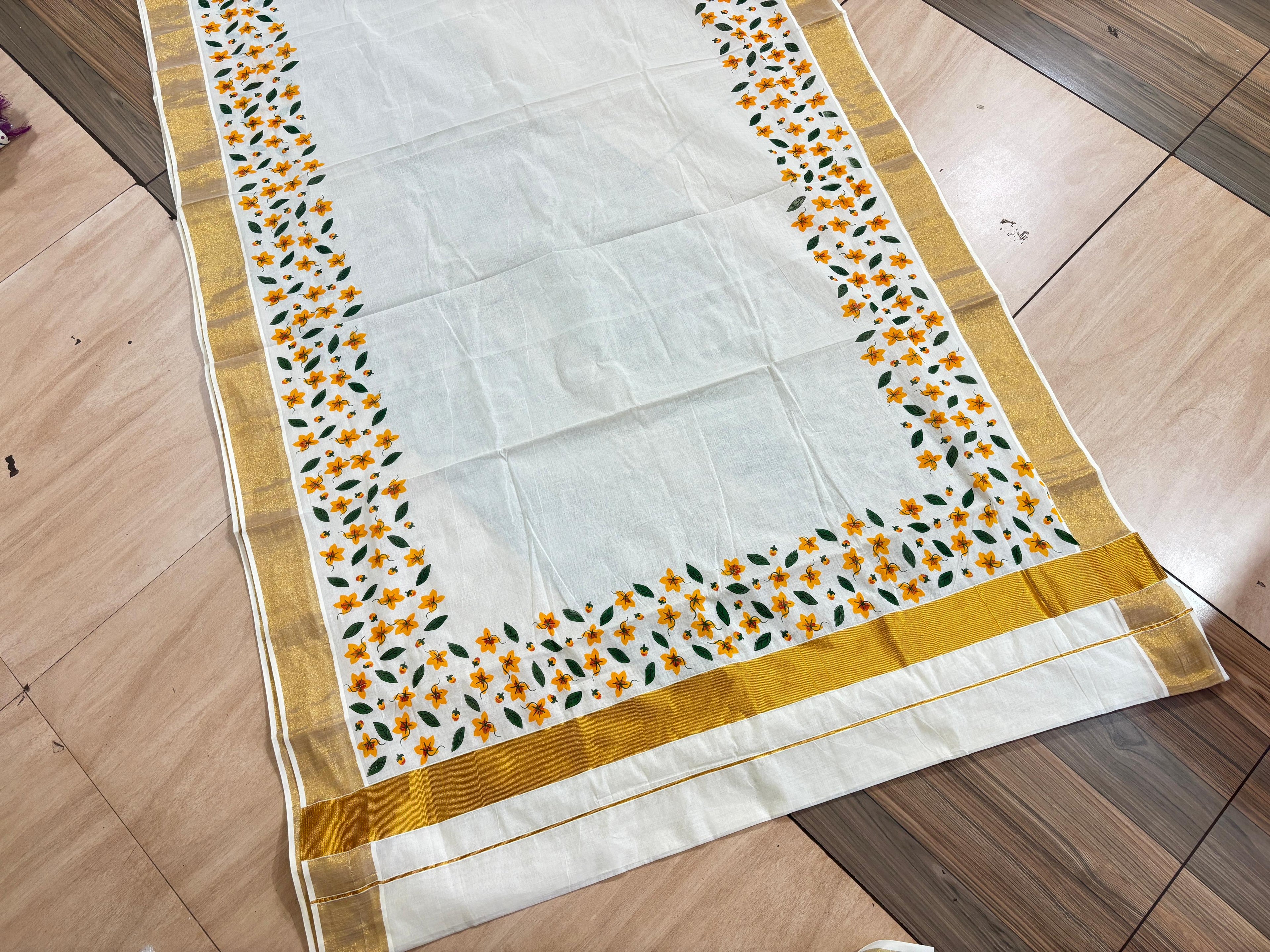 Yellow scattered flower printed cotton saree