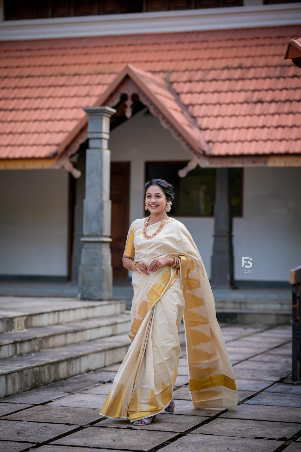 Border temple weave golden tissue saree