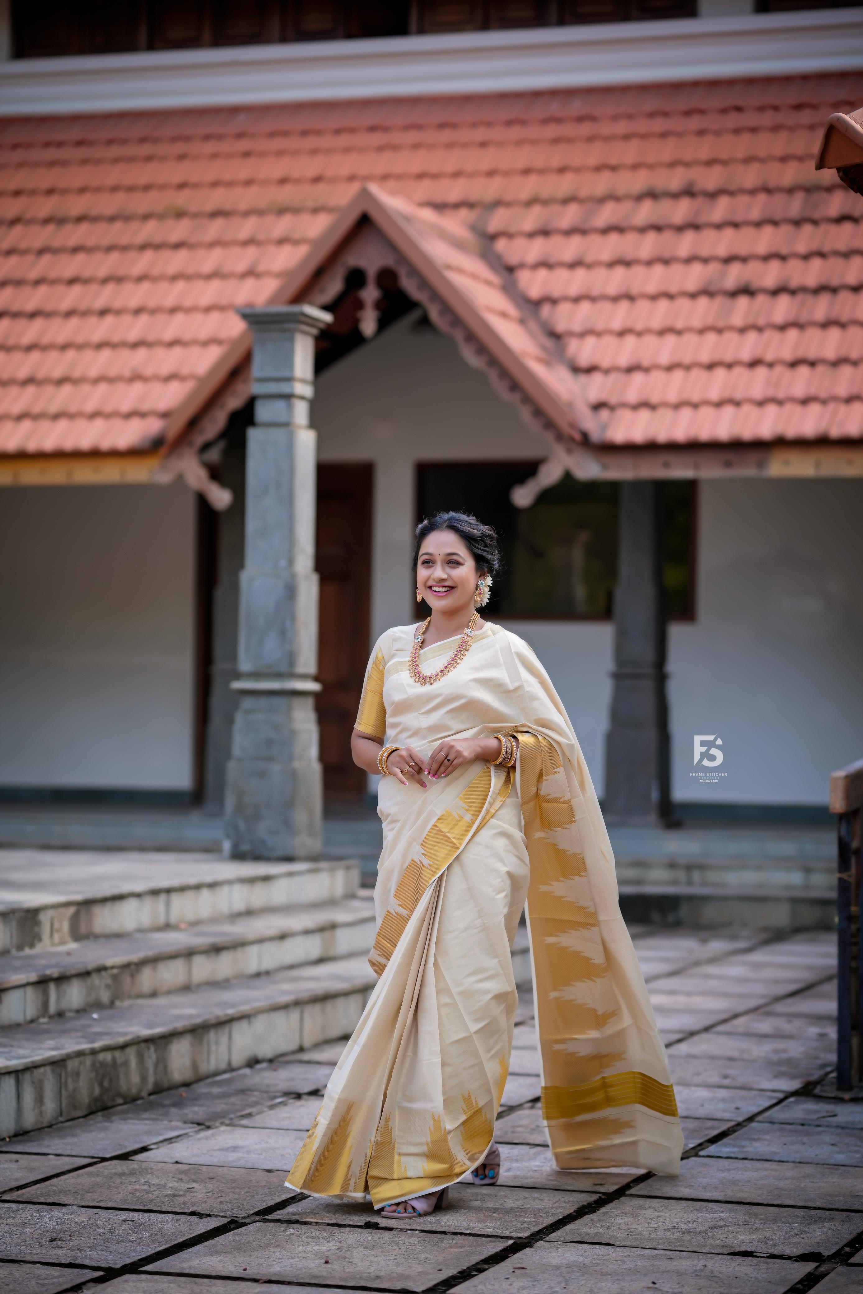 Border temple weave golden tissue saree