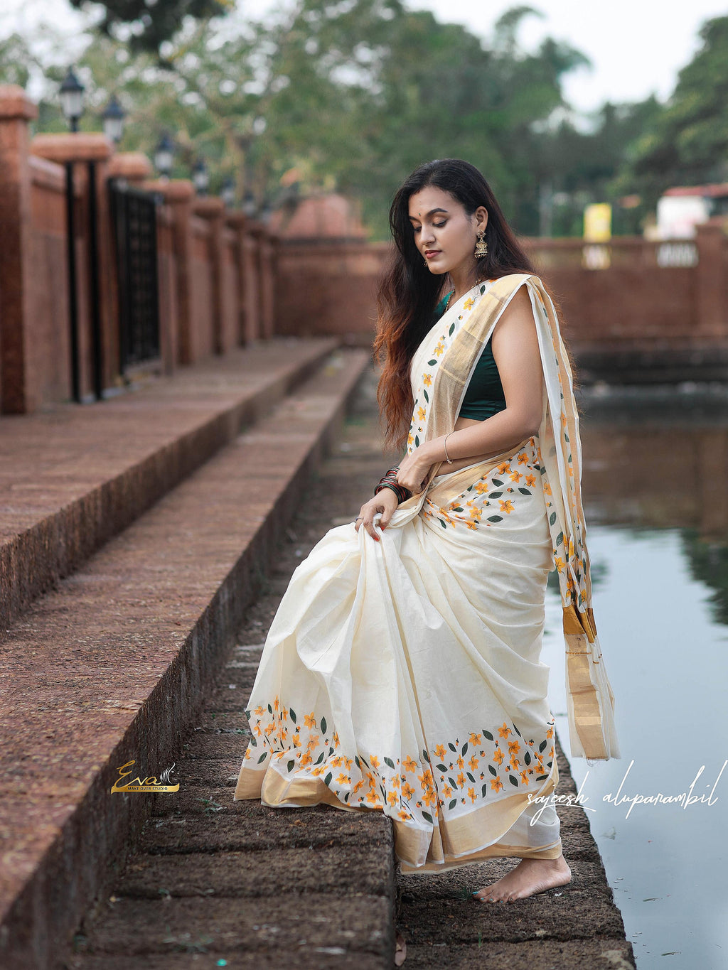 Yellow scattered flower printed cotton saree